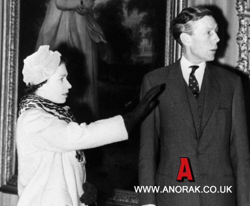 1439266 - Queen Elizabeth II discusses some of the exhibits with Sir Anthony Blunt (extreme right), watched by Sir Kenneth Clark (extreme left), during her visit to the Courtauld Institute of Art, London University. On 16th November 1979, Sir Anthony Blunt, the Queen's Adviser on Art, was exposed as a Russian Spy and part of the notorious Cambridge Spy Ring