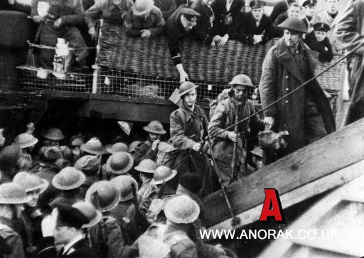 1299016 - British soldiers are assisted by the Royal Navy in June 1940, on their return to England after being evacuated from the beaches of Dunkirk, Northern France. 338,226 soldiers, mostly from the British Expeditionary Force, were rescued from the advancing German Army between May 19th and June 4th. Veterans of the Dunkirk evacuation will tomorrowMOnday May 15 2000, reunite for almost the last time to mark the 60th anniversary of their remarkable escape from the shores of France. See PA story SOCIAL Dunkirk. PA Photos second world war