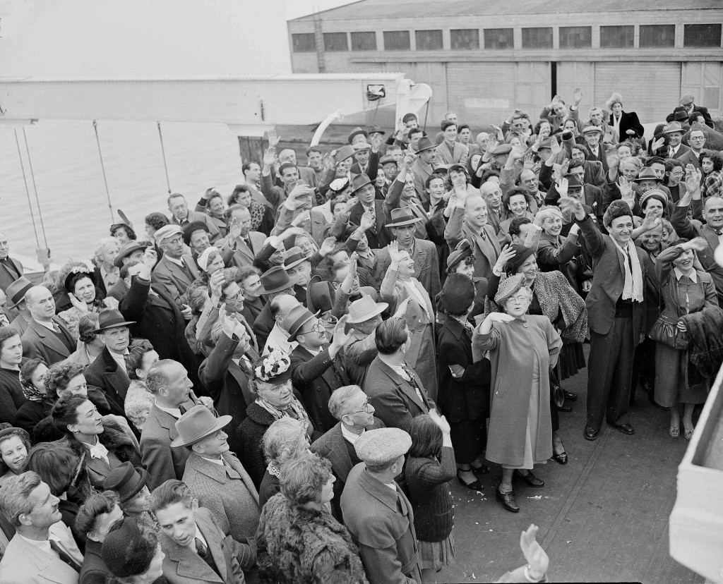 Jewish displaced people aboard SS General Gordon at San Francisco cheer Jewish welfare officials and others who wish them well on their journey to Israel, Feb. 21, 1949. They have arrived from Shanghai and will be transported in a sealed train across the U.S. to New York where they will board a vessel bound for Palestine. (AP Photo/Ernest K. Bennett) Ref #: PA.16054881  Date: 21/02/1949