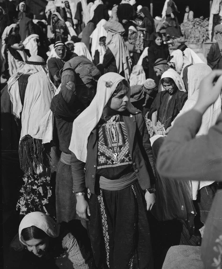 Arab girls shop in the market place near Manger Square in Bethlehem, Nov. 28, 1947. (AP Photo/Jim Pringle) Ref #: PA.5737158  Date: 28/11/1947