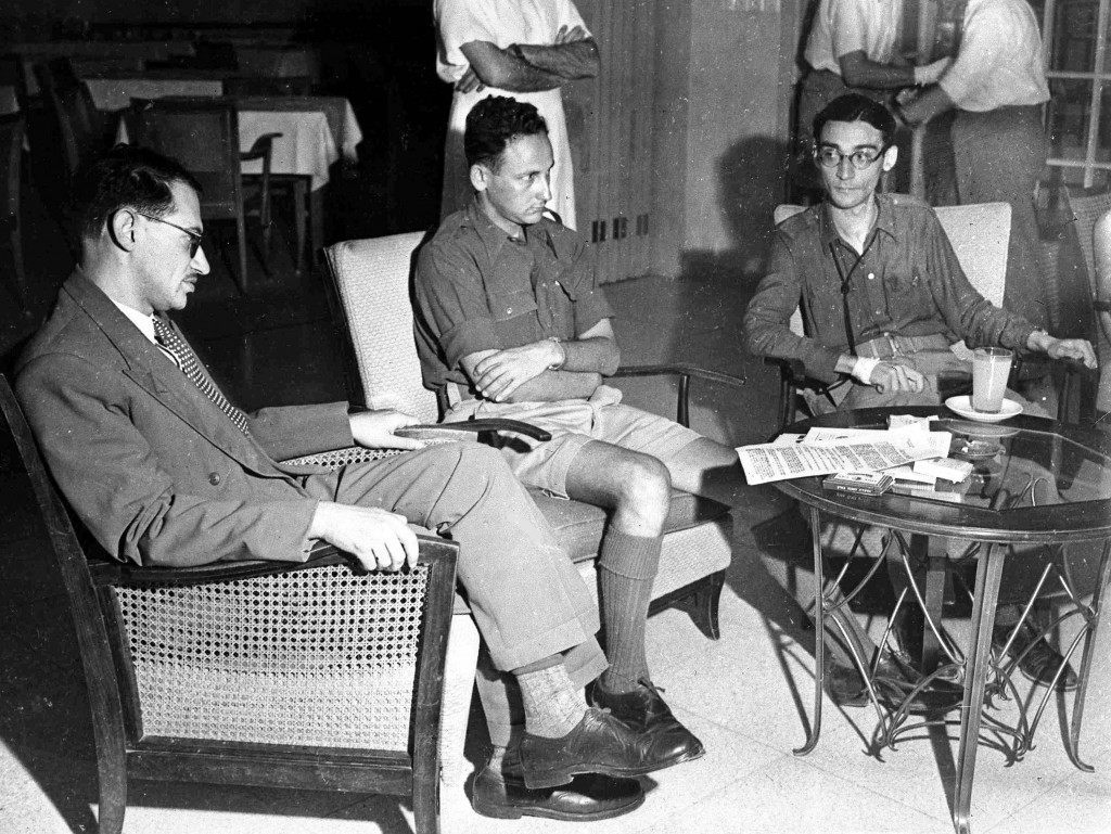 Leaders of the Jewish force, Irgun Zvei Leumi, announce to the press their acceptance of the demand by the Israeli provisional government for the immediate disbandment of Irgun, Jerusalem, Palestine, Sept. 21, 1948. Left to right; 'Karni', the spokesman of Irgun; 'Avinoam', the commander of the Irgun forces in Jerusalem; 'Leilerovits, liason officer. Following this acceptance soldiers of the Israeli army immediately commandeered arms at Irgun posts in the city. (AP Photo/Pringle) Ref #: PA.5755050  Date: 21/09/1948
