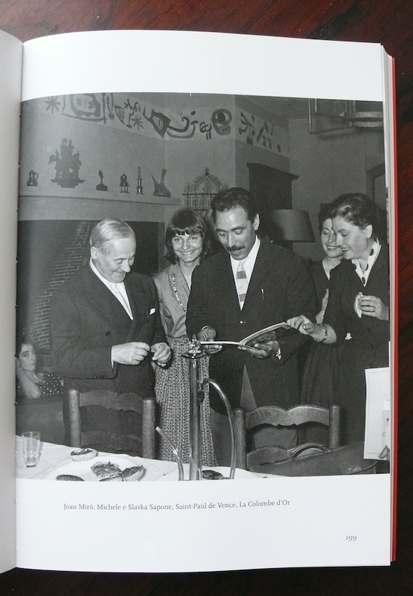 With Joan Miró (left), Slavka and others at the hotel La Colombe d'Or in Saint-Paul de Vence, early 60s. Note Miro's wall decorations in background