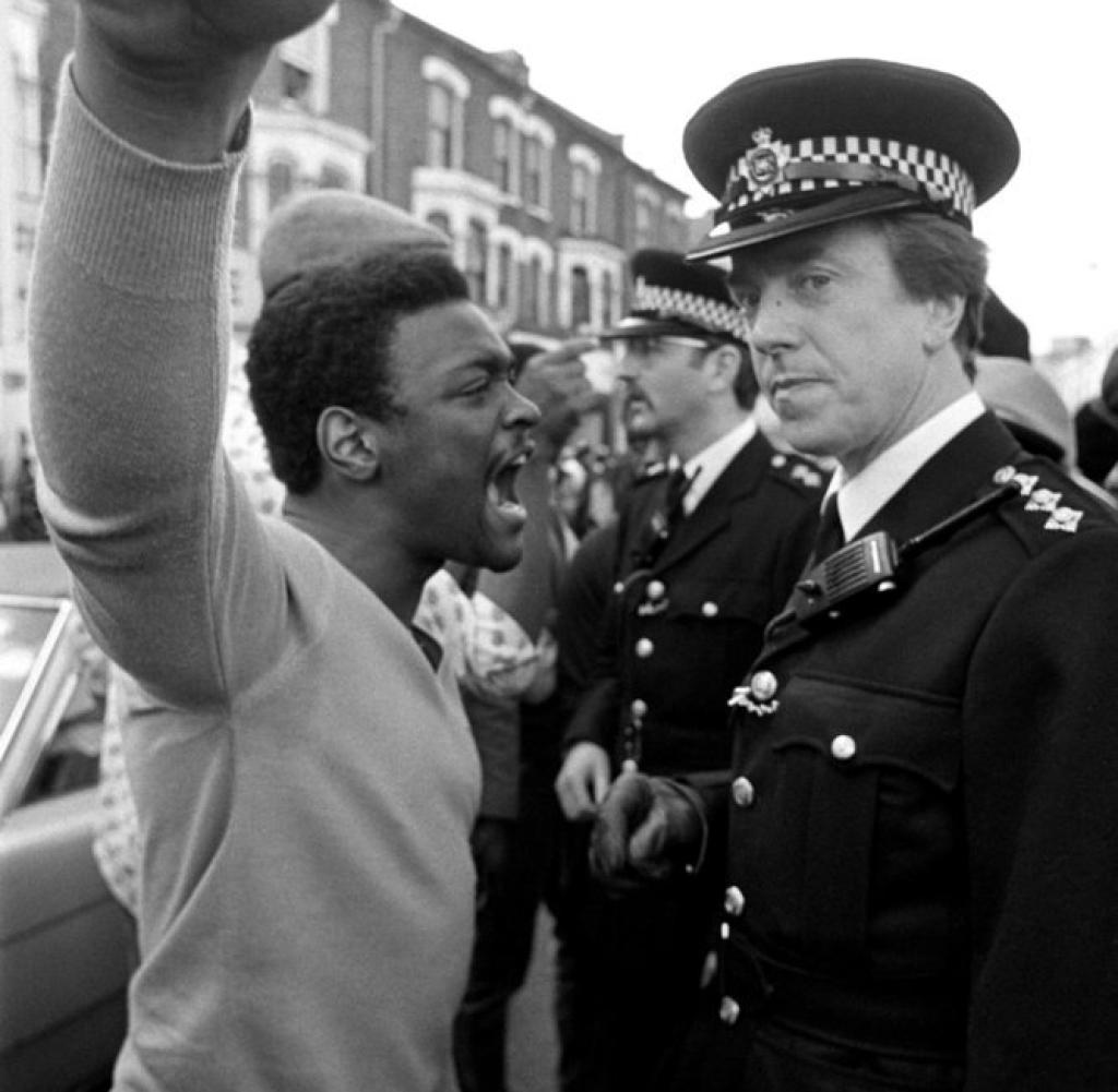 A Brixton man confronts a police officer during the street unrest in 1981. 