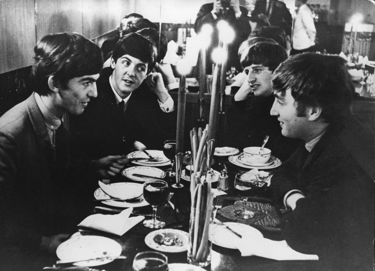 5th October 1963:  The Beatles meet for the first time after their holidays by candlelight at the Star Steak House in Shaftsbury Avenue, London. This evening they appear on 'Ready, Steady, Go', the British music television programme.  (Photo by Keystone/Getty Images)