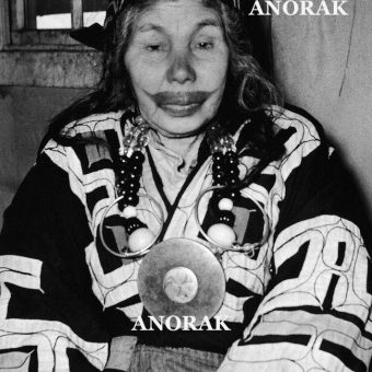 1953: The wife of an Ainu chief displays tattoo around her lips