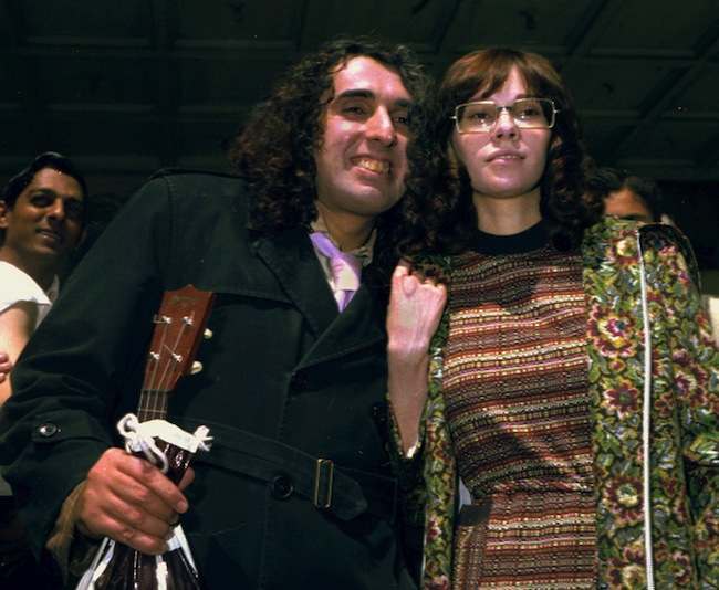 ...with his wife, Miss Vicki, pose outside the hospital where she gave birt...