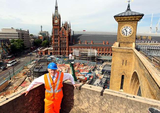 Mayor of London Boris Johnson views the new square at King's Cross station.