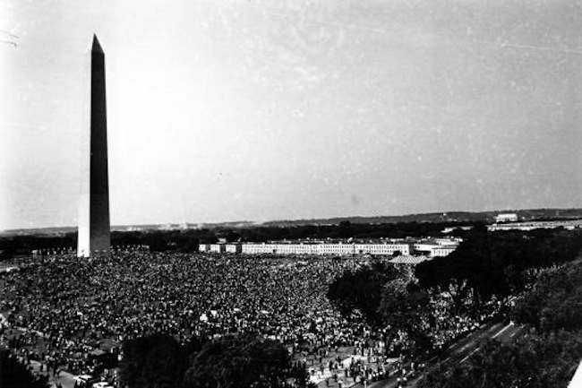 This general view shows civil rights demonstrators gathered at the Washington Monument grounds before noon on Aug. 28, 1963. The marchers will parade to the Lincoln Memorial, seen in the far background at right, where the March on Washington for Jobs and Freedom will end with Dr. Martin Luther King Jr.'s "I Have A Dream" speech. (AP Photo)
