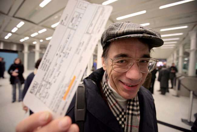 Roger Kemp from north London, the first passenger aboard the first Eurostar train to depart from London Waterloo at 8:23am on November 14, 1994, and the first today, with his ticket at the new terminal at St Pancras station.
