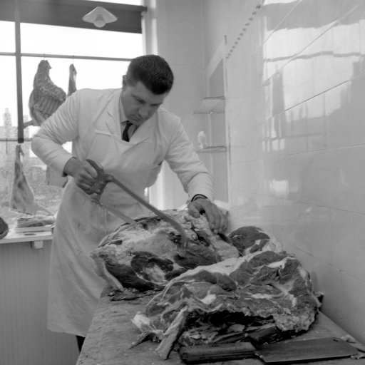 John 'Jack' Taylor is the man in white sawing a carcass at a butchers shop in Staveley Road, Wolverhampton. He will have a hundred thousand pairs of eyes on him at Wembley Stadium when he officiates the FA Cup final between Everton and Sheffield Wednesday.