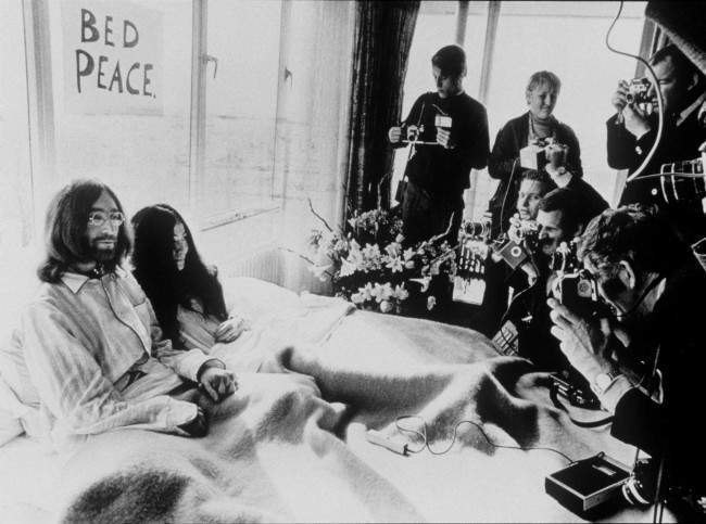 On This Day In Photos: Yoko Ono Saves John Lennon From The Beatles And ...