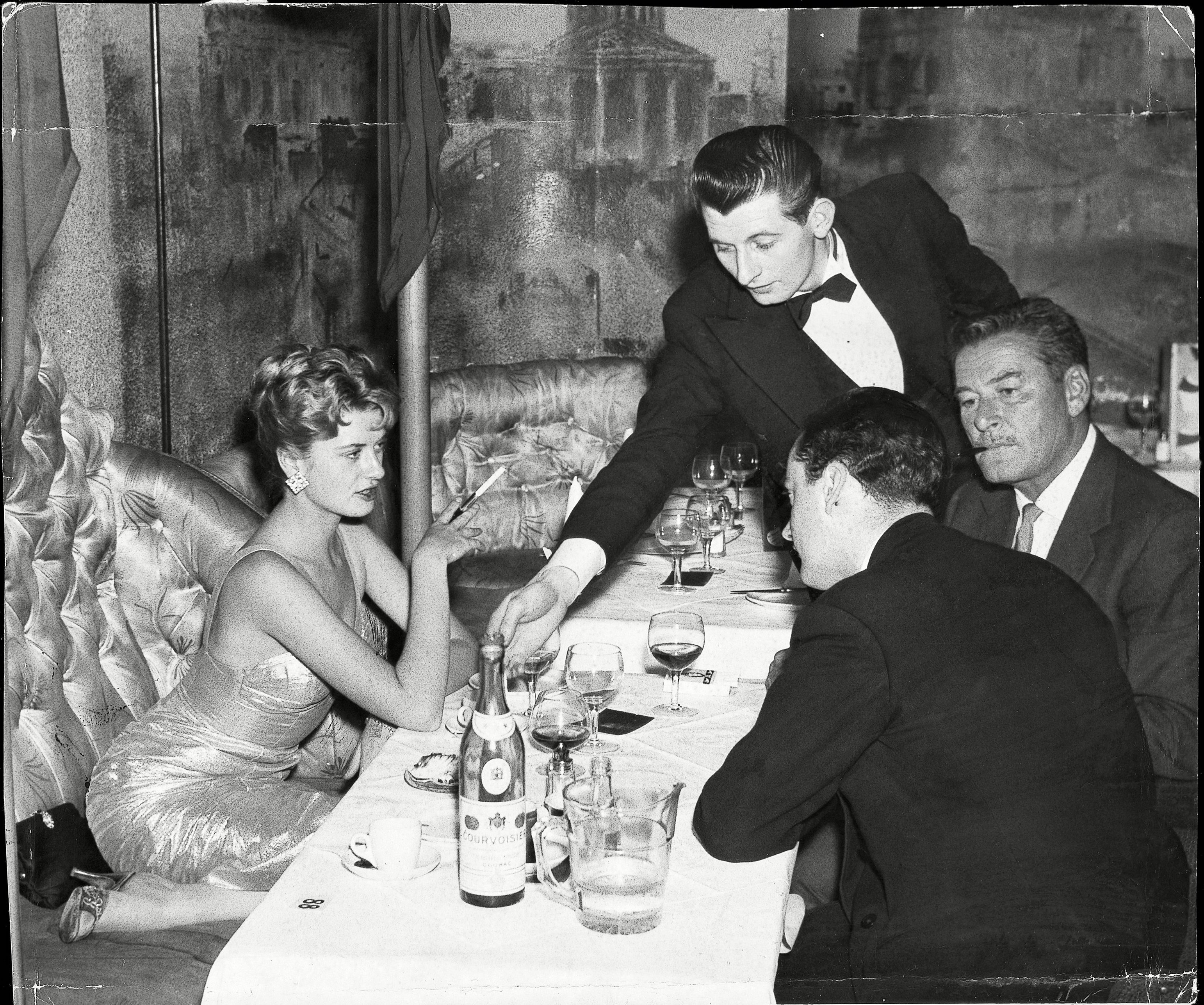 Errol Flynn Pictured With Beverley Aadland at The Lido Nightclub on Swallow Street, just off Piccadilly, 5th May, 1959. The Couple Starred In The Film Cuban Rebel Girls And Had A Highly Publicised Relationship For The Last Two Years Of Flynn's Life.