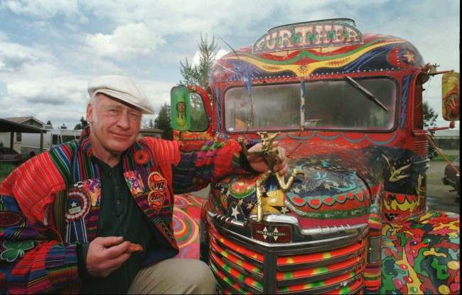 Author Ken Kesey poses with the magic bus Further, a descendant of the vehicle that carried him and the Merry Pranksters on the 1964 trip immortalized in the Tom Wolfe book, "The Electric Kool-Aid Acid Test.'' Kesey is taking the bus to the Rock and Roll Hall of Fame and Museum for an exhibit on the psychedelic 1960s.