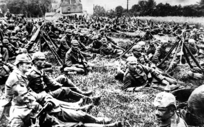 In this undated photo German soldiers resting near Ypres, Belgium on the way to the Flanders battle front during World War I.