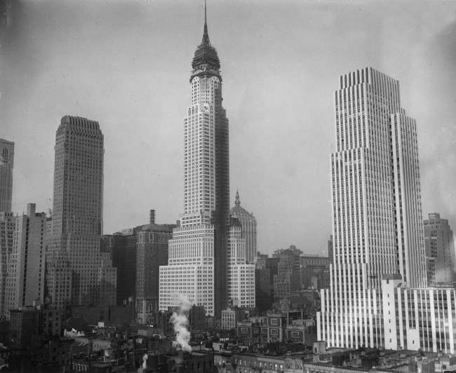 The New York skyline in Midtown is shown with its new addition of the Chrysler Building, center, with the Channin Building on the left and the New York Daily News Building at right, Nov. 20, 1929. (AP Photo)