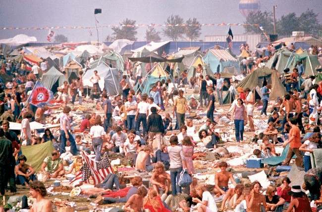 Music fans gather for the Rolling Stones 'Gimme Shelter' concert at Altamont Speedway in Livermore, Ca. on Dec. 8, 1969. The Hell's Angels motorcycle gang was hired as bouncers at the show where a fan was fatally stabbed by one of their members. (AP Photo) 