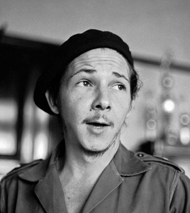 his January 1959 file photo shows the younger brother of Cuba's revolutionary leader Fidel Castro, Raul Castro, as a young guerilla soldier in an undisclosed location in Cuba. Raul Castro, now the current leader of the Communist-run island 