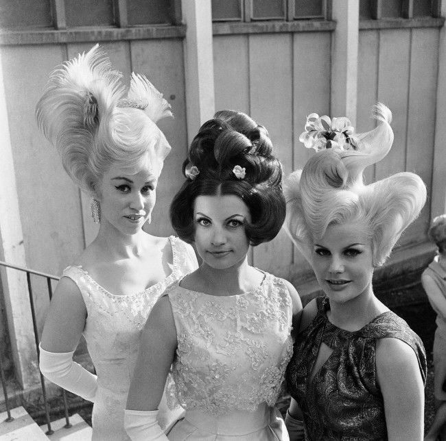 These are the prize winning coiffures in a contest in Munich, Germany on May 1, 1964. They were designed for evening wear and hairdressers said anyone with a little time can copy them.