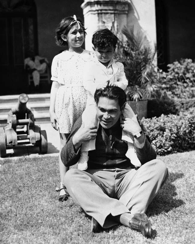 Colonel Fulgencio Batista, Cuba's strong man, playing with his children at his Havana home, on March 14, 1937.