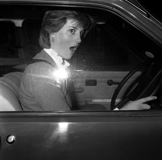 Lady Diana Spencer's look of astonishment as she stalls her car - a new Mini Metro - outside her Earl's Court flat when leaving for her job as a teacher at a kindergarten in Pimlico, London. Speculation continues that she may have a romantic involvement with the Prince of Wales. Date: 17/11/1980 