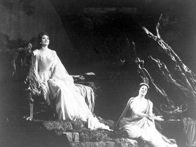 Greek opera star Maria Callas, left, rehearses the title role of Bellini's "Norma" for the gala production at the Opera House, Paris, May 22, 1964. Italian opera star Fioenza Cossotto, right, portrayed the role of Adalgisa. (AP Photo) Date: 22/05/1964
