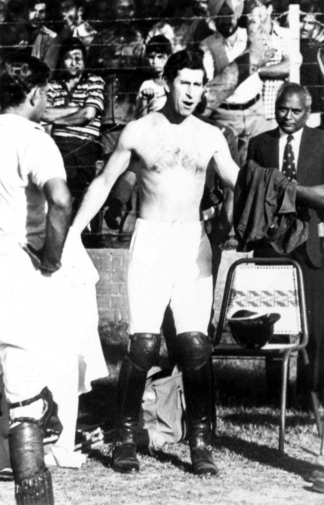 Britain's Prince Charles changes his shirt at the end of a polo match in New Delhi, India, on Nov. 26, 1980.