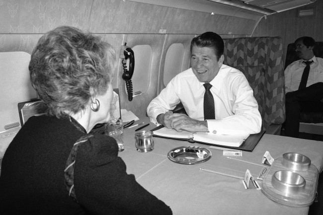 President-elect Ronald Reagan and with Nancy relax aboard a twin-engine Air Force jet from the presidential fleet on the way to Washington to meet with congressional leaders on Monday, Nov. 17, 1980 in Washington. Later in the week are scheduled to meet with President Carter and First Lady Rosalynn to the White House.