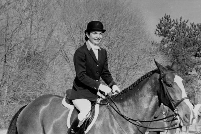 Jackie Onassis rides on horseback in the traditional Essex Fox Hounds Meeting, the annual Thanksgiving Day hunt in Bedminster, N.J., Thursday, Nov. 27, 1980.