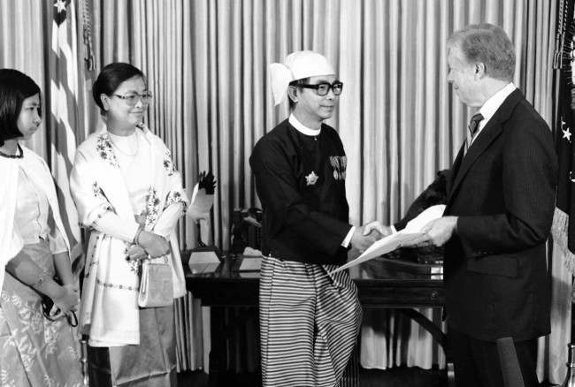 President Jimmy Carter, right, accepts credentials at the White House in Washington from the Socialist Republic of the Union of Burma's Ambassador U Kyaw Khaing, Nov. 24, 1980. 