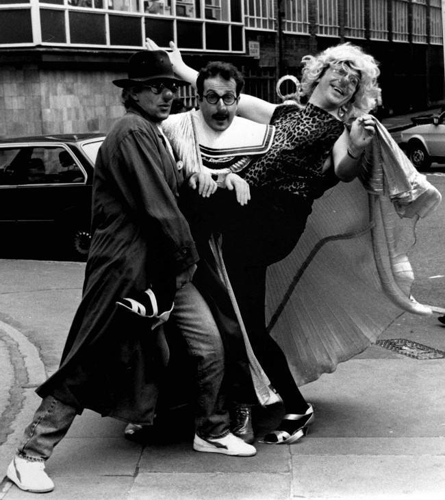 PA NEWS PHOTO 5/2/88 RADIO 1 DJ'S GARY DAVIES, STEVE WRIGHT AND SIMON BATES OUTSIDE THE BBC BROADCASTING HOUSE, LONDON DRESSED AS FAMOUS POP STARS FOR THE COMIC RELIEF APPEAL