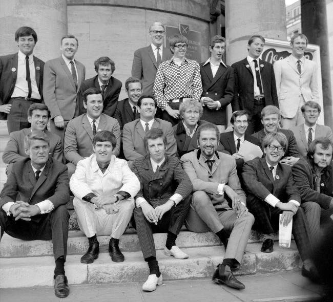 Mr Robin Scott, Controller, Light Programme, who heads the BBC's new Radio 1 (Pop) and Radio 2 (Light) radio network, pictured (centre, background) at Broadcasting House, Portland Place with disc jockeys who will be in the spin of things on Radio 1, many of them were formerly with "pirate" radio stations. Left to right: Back row - Tony Blackburn, Jimmy Young, Kenny Everett, Duncan Johnson, David Rider, Dave Cash, Pete Brady and David Symonds. Middle row - Bob Holness, Terry Wogan, Barry Alldis, Mike Lennox, Keith Skues, Chris Denning and Johnny Moran. Front row - Pete Murray, Ed Stewart, Pete Drummond, Mike Raven, Mike A'Hern and John Peel. Date: 04/09/1967