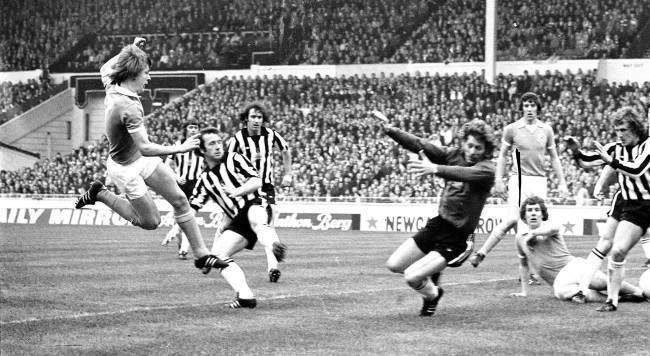 Peter Barnes (left) scores Manchester City's first goal after nine minutes in Football League Cup final with Newcastle United at Wembley. Beaten Newcastle 'keeper is Mike Mahoney.