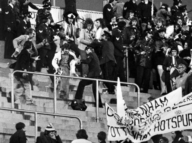 Soccer - UEFA Cup Final - Second Leg - Feyenoord v Tottenham Hotspur - Rotterdam Police clash with Tottenham Hotspur supporters during the second leg of the UEFA Cup final against Feyenoord in Rotterdam. About 200 people were reported to be injured in the violence. archive-pa166746-2 and -3 Ref #: PA.17556271 Date: 30/05/1974