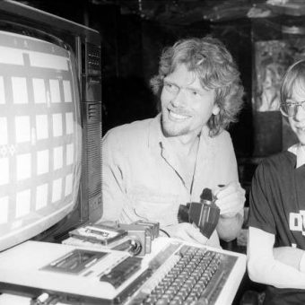 1983: Simon Birrell of Norwich Shows His BBC Micro Computer Game Bug Bomb To Virgin Interactive’s Richard Branson