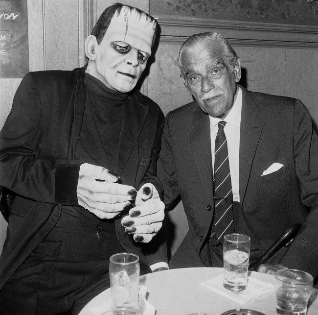 Actor Boris Karloff, right, gets a look at what he looked like in movies not too many years ago, at a party in Karloff's honor at the Magic Castle in Hollywood, an old mansion where magicians meet, April 18, 1967. Manuel Welton is inside the Frankenstein costume. (AP Photo/Harold P. Matosian) Date: 18/04/1967