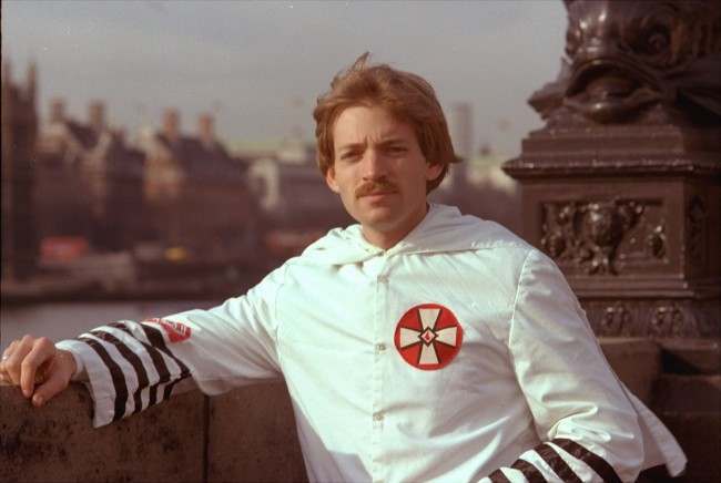 David Duke, 27-year-old Ku Klux Klan leader, poses in his Klan robes in front of the House of Parliament in London in March of 1978. Although he was banned from entering Britain, he arrived here by way of a Skytrain flight from New York. 