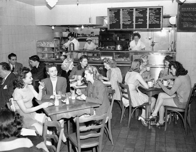 Between shows, some of the Rockettes have lunch in the backstage theater at the Music Hall in New York on March 26, 1946. One advantage is that they can eat here without changing into street clothes. The cafeteria, which is for the use of all the theaterÂs employees, is open until about 8 p.m. 