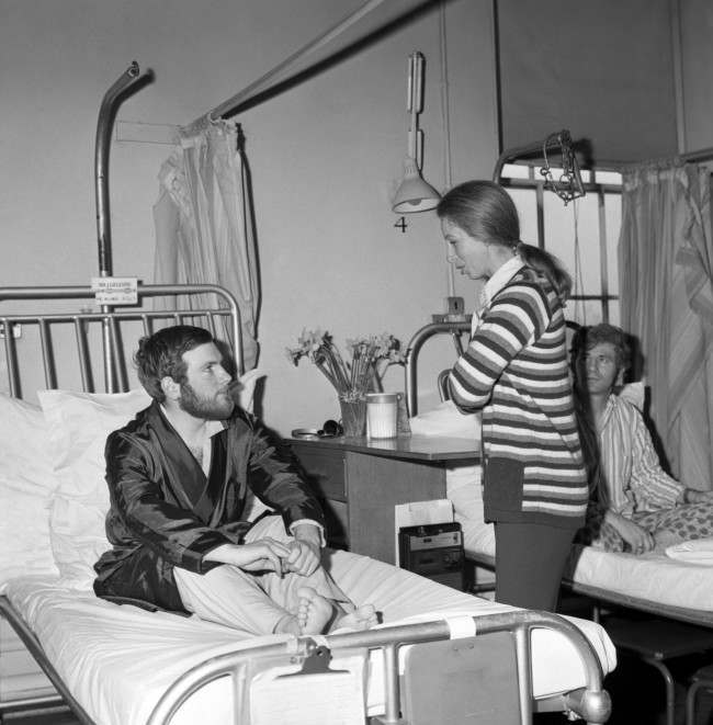 Princess Anne talks to PC Michael Hills, who was injured during Ian Ball's attempt to kidnap Princess Anne in Pall Mall. 923-Archive-pa165834-65 Ref #: PA.19319596 Date: 25/03/1974