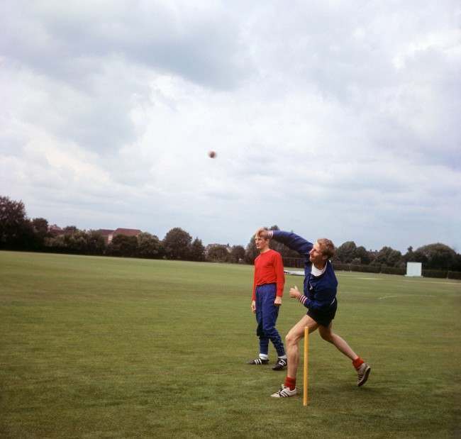 England's Jack Charlton bowls watched by George Eastham at Roehampton Ref #: PA.5136500  Date: 29/07/1966 