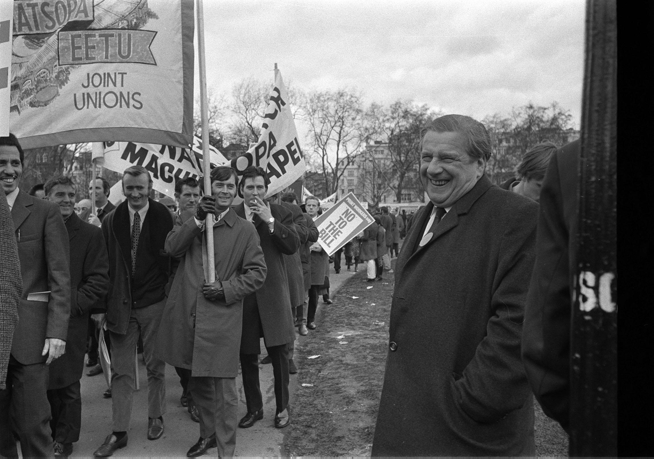 Sunny smiles on a serious occasion for TUC General Secretary Mr Vic Feather and Trade Union demonstrators as they started off a march from Speaker's Corner Hyde Park to Trafalgar Square in an organised an ddsciplined parade against the Government's Industrial Relations Bill.