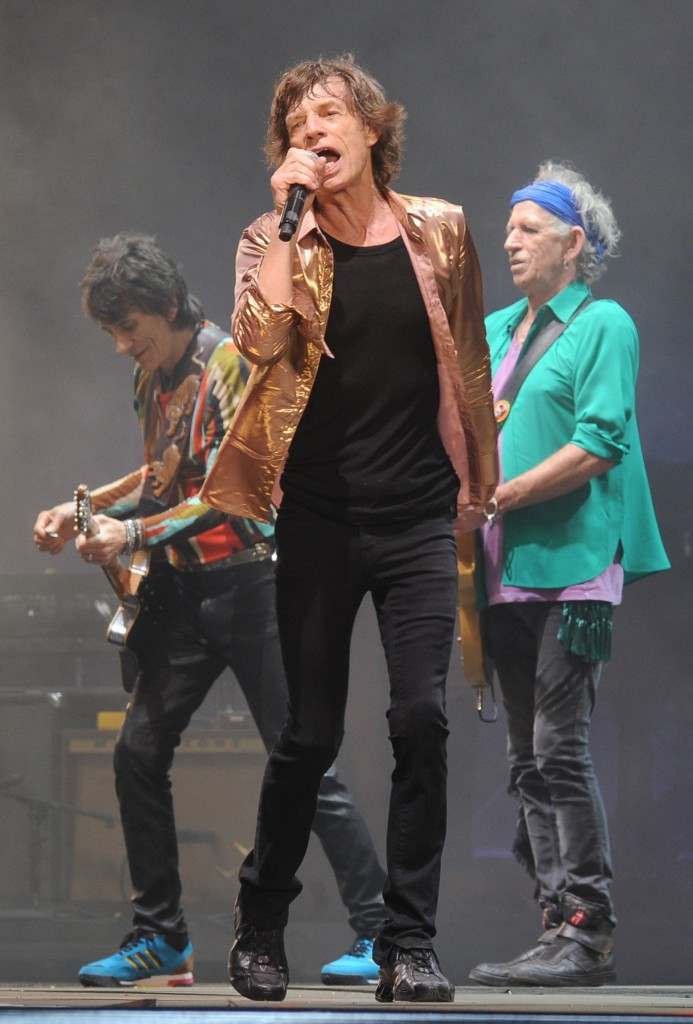 Mick Jagger (centre), Keith Richards (right) and Ronnie Wood (left) from the Rolling Stones perform on the Pyramid Stage during the Glastonbury 2013 Festival of Contemporary Performing Arts at Pilton Farm, Somerset. 29/06/2013 Picture by: Anthony Devlin/PA Archive/Press Association Images Image Size: 1470x2172