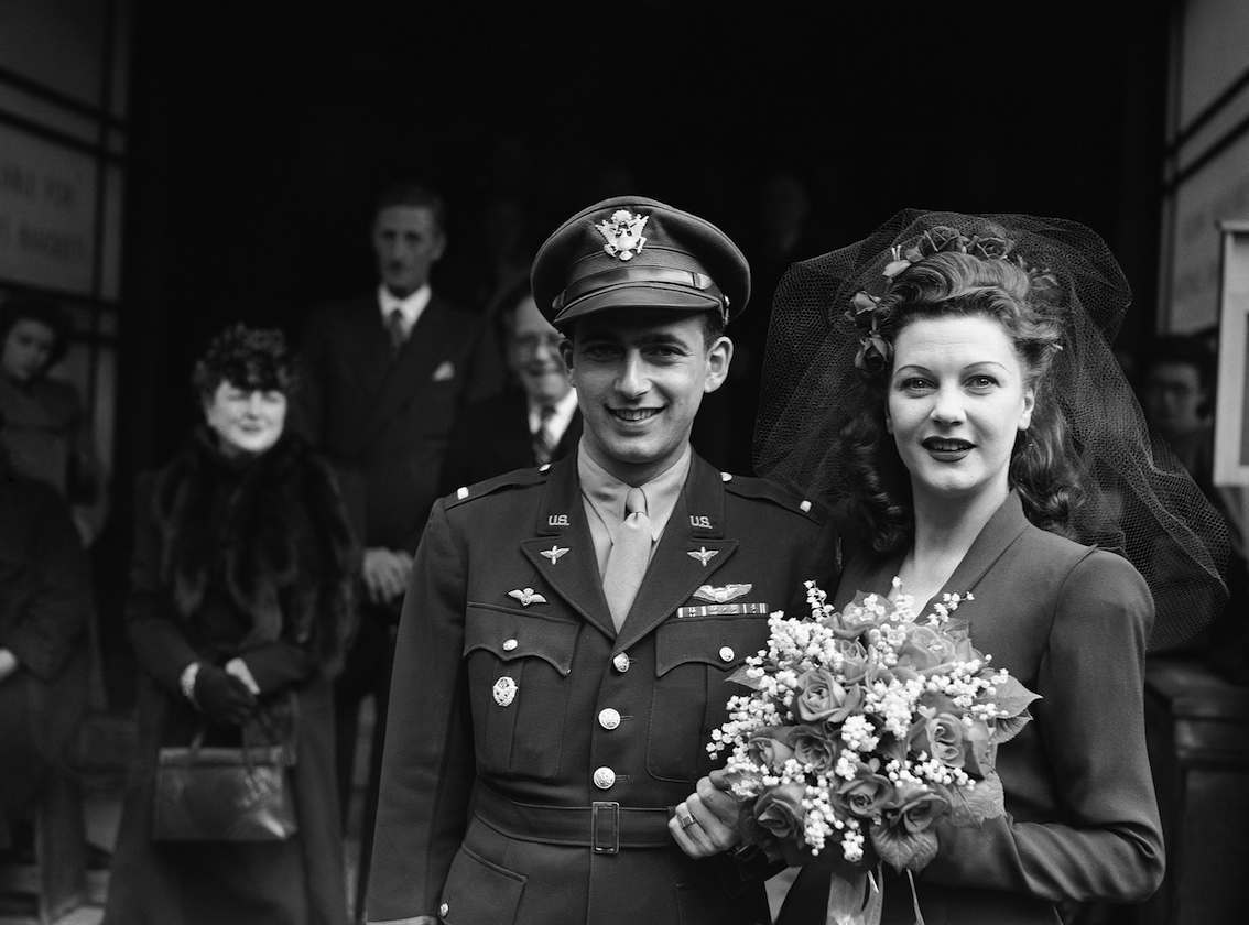 Jean Gillie, the young London actress, was in “Something in the Air” at the palace theatre, when she married on May 5, 1944 at Caxton Hall in London to Lieut. Jack Bernhard, D.F.C., U.S.A. Air Force, whose father is Mr. Joseph Bernhard, vice-president of Warner Brothers, the Hollywood film producers. Bride and bridegroom after the ceremony. (AP Photo)
