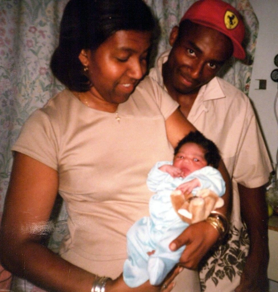 Greg Watson who was fatally stabbed at Notting Hill Carnival, with his new born daughter Amber, and his mother Janet Watson. Mrs Watson appealed for witnesses into her son's death at the headquarters of the Metropolitan Police, New Scotland Yard in London.  Ref #: PA.1337927  Date: 04/09/2000