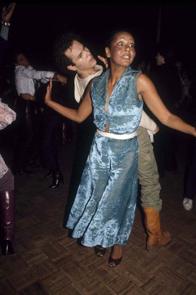 A couple dances back to back on the dance floor of New York's Studio 54, 1977. (AP Photo) Ref #: PA.17645267  Date: 01/01/1977 