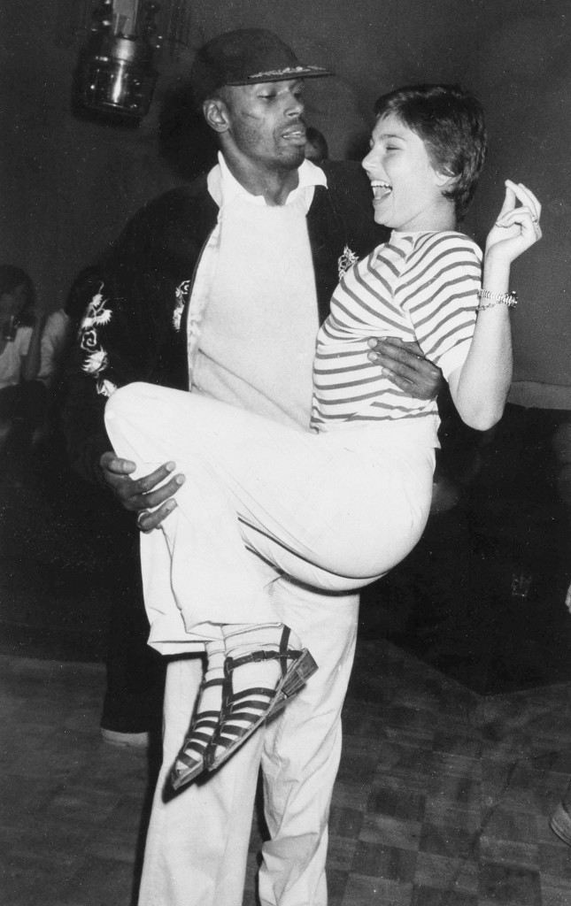 Young actress Tatum O'Neal, daughter of actor Ryan O'Neal, enjoys the ride as dancer Sterling Saint Jacques gives her a lift during an evening of dancing at New York's Studio 54, April 23, 1978. (AP Photo) Ref #: PA.17654490  Date: 23/04/1978