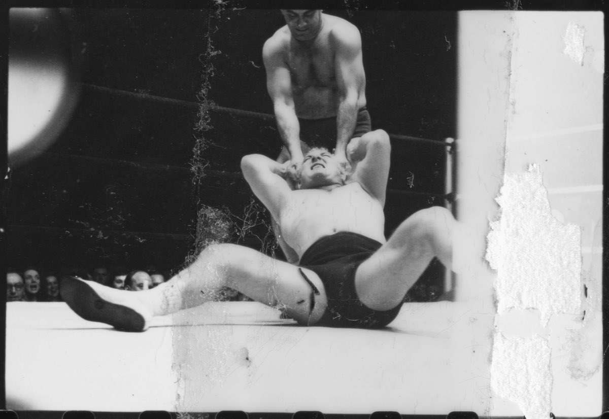 Gorgeous George and another man wrestling in Chicago