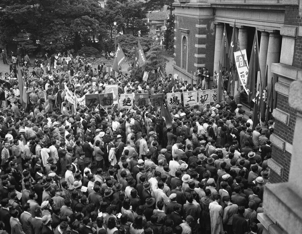 Inside the compound of the headquarters of the Japanese Red Cross in Tokyo (Shiba Park district) on June 3, 1950 as the Communists inspired workers met to demonstrate against the arrest of eight men charged with attacking a group of American soldiers in Tokyo on Memorial Day. The crowd was orderly and no reports of violence or disturbance was reported. (AP Photo/Charles Gorry) Ref #: PA.11324421  