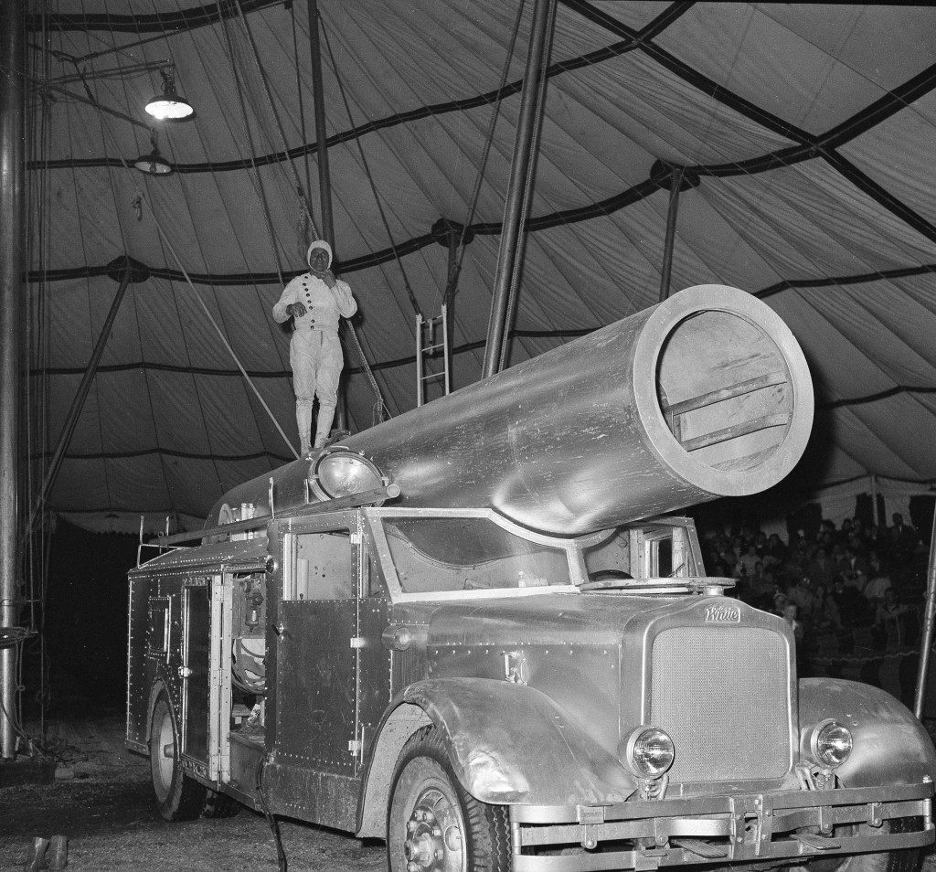 Circus star G. Hugo Zacchini, famous for 30 years as "The Human Cannonball", prepares to climb into the mouth of his cannon during his act in a circus at Palisades Park, N.J., April 11, 1958. Zacchini, who is shot into space twice a day, now is billed as "The Human Satellite." The altered billing reflects his new aim in life - a trip in a rocket. Zacchini is convinced that only a cannon man, used to looking upon life as a bore, is mentally and physically equipped for a space journey. (AP Photo/Matty Zimmerman) Ref #: PA.16860988 