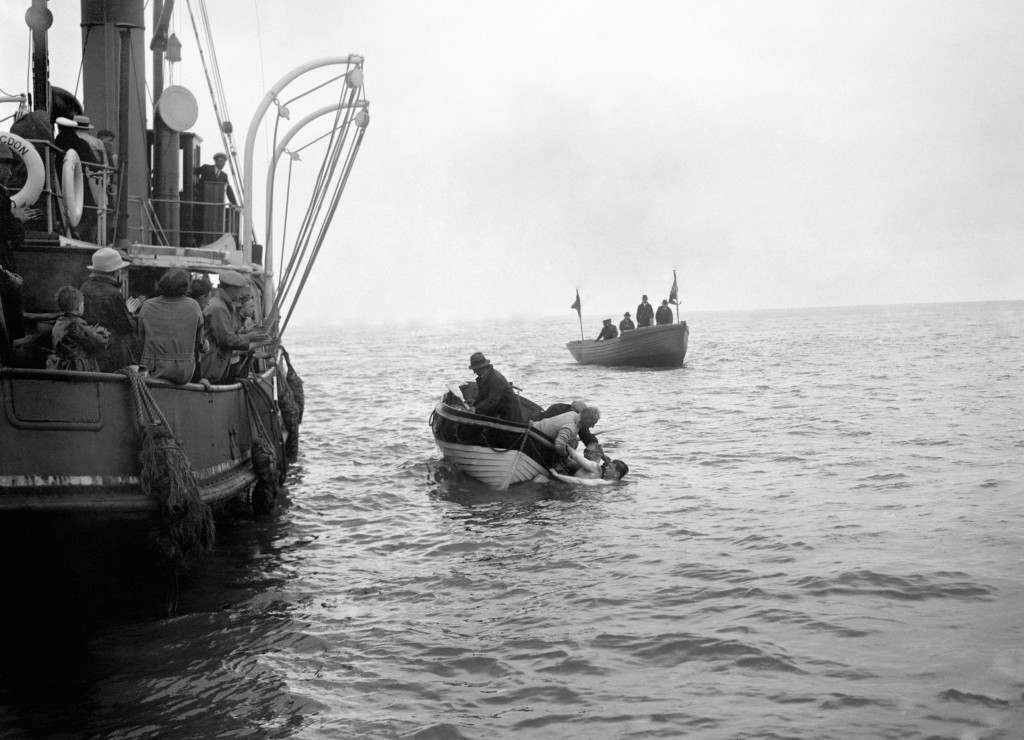 Lt. Colonel Freyberg being taken from the water into the rowing boat, only a quarter of a mile from the Kent coast, after attempting to swim the English Channel. Ref #: PA.5510548  Date: 05/08/1925