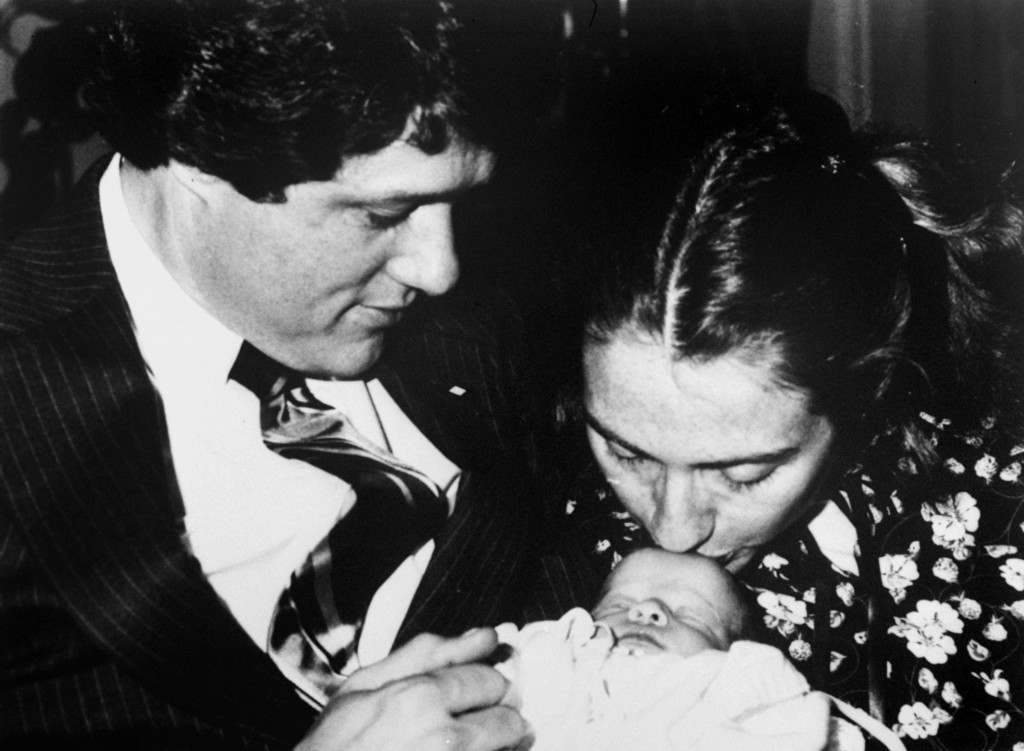 Arkansas Gov. Bill Clinton, wife Hillary Rodham, 33, and week-old baby daughter Chelsea pose for a family picture, March 5, 1980. (AP Photo/Donald R. Broyles) Ref #: PA.6038880  Date: 05/03/1980